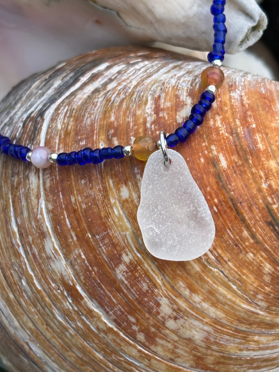 Seaglass necklace with dark blue seed beads and mixed agate