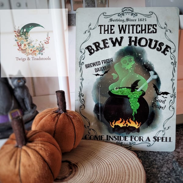 The witchs brew house metal sign 