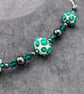 Cream and emerald green lampwork glass Swarovski Crystal and haematite necklace - Image 3