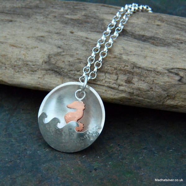 Silver domed under the sea pendant with copper seahorse