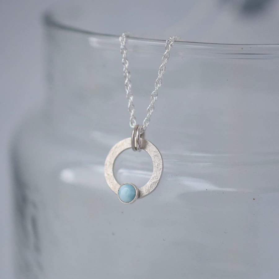 Sterling silver circle pendant with larimar gemstone