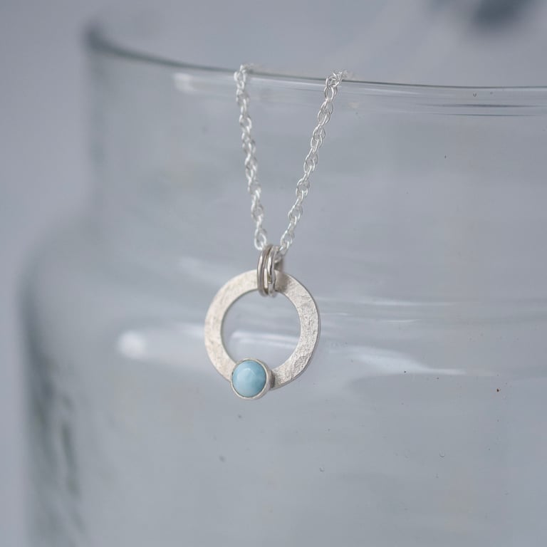Sterling silver circle pendant with larimar gemstone