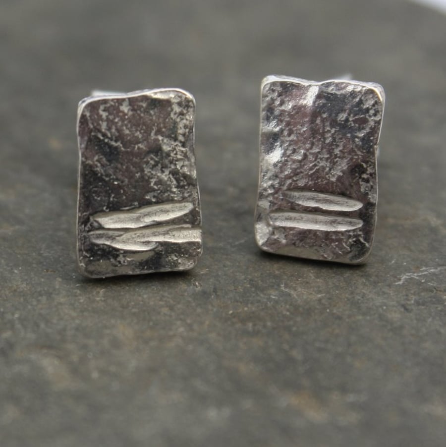 Silver notched studs