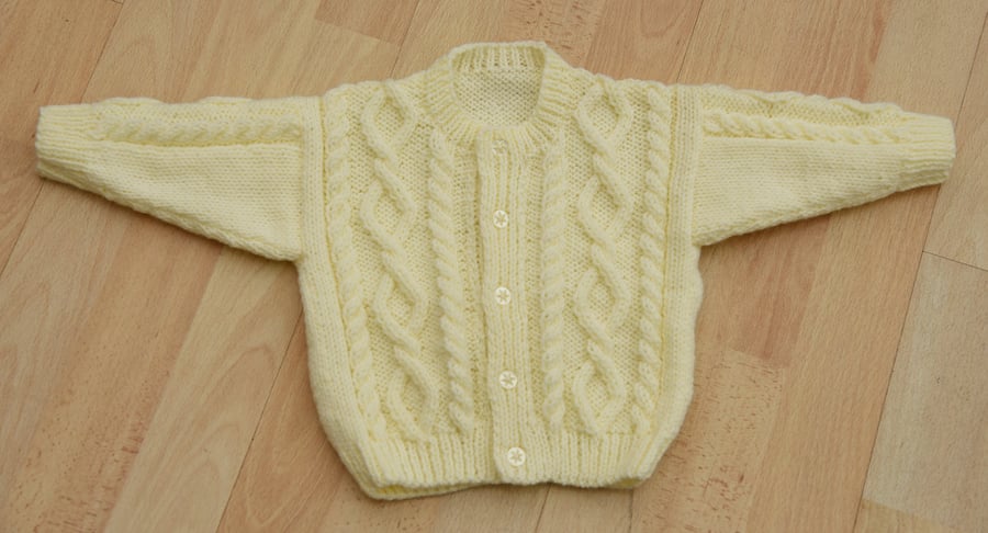babies hand knitted aran style cardigan  to fit age 3 to 6 months 41cms 