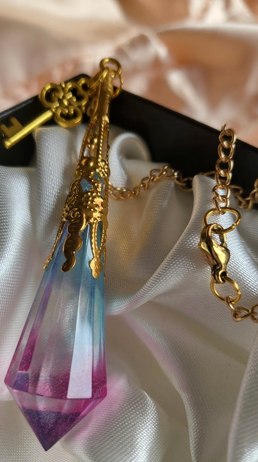 Pink, Blue And Gold Resin Pendant Necklace 