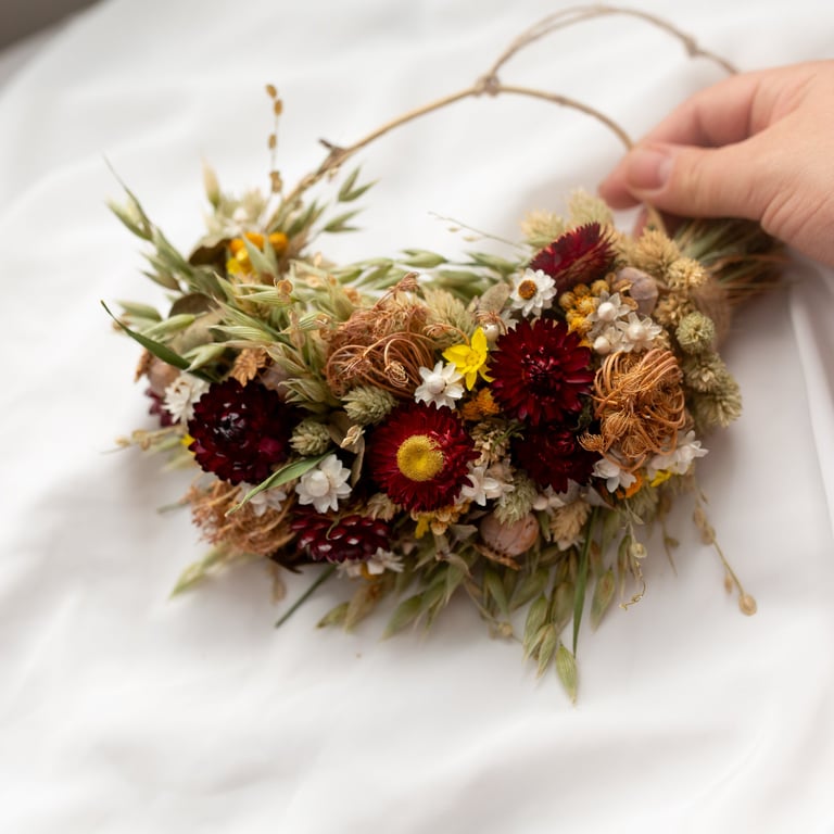 Small handmade red and yellow dried flower wreath