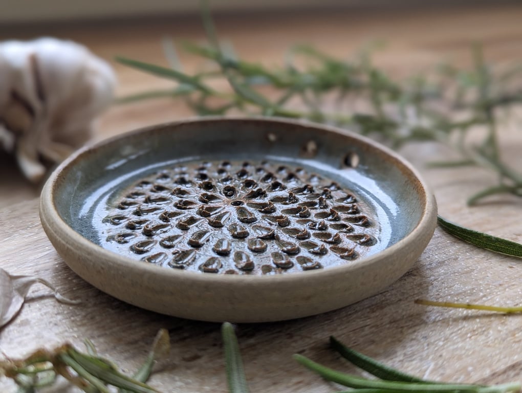 Hand thrown grater and herb stripper 