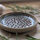Hand thrown grater and herb stripper 
