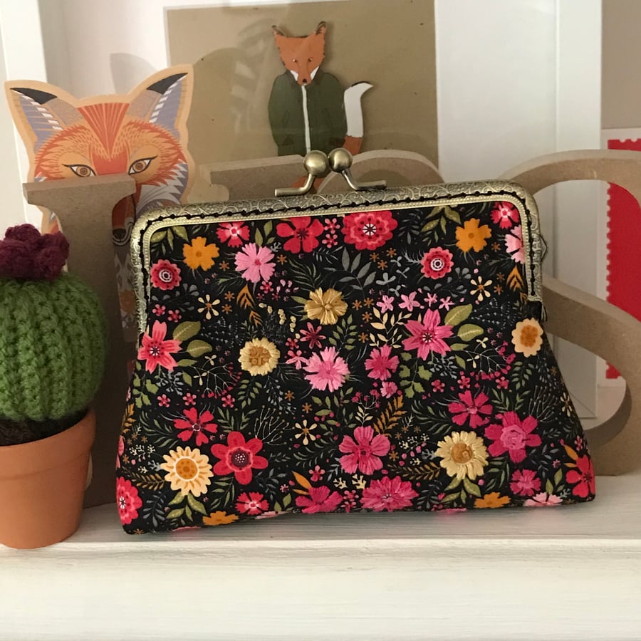 Black and bright floral clasp purse