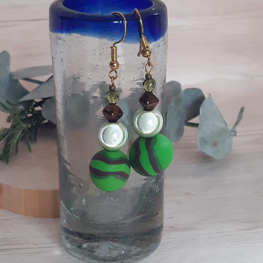 Bright green and chocolate dangly earrings