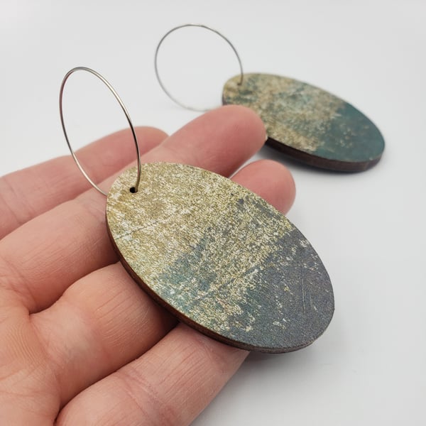 Dark green and antique gold printed oval shaped earrings