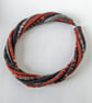 The Wrapped Twist: felted cord necklace in shades of rusty orange and greys - Image 2