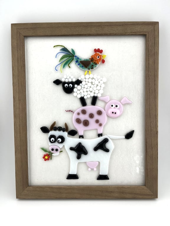 Fused glass animal stack picture.