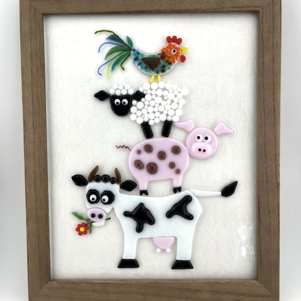 Fused glass animal stack picture.