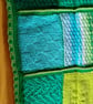 baby and toddler handmade knitted baby blanket in green colourway. - Image 7