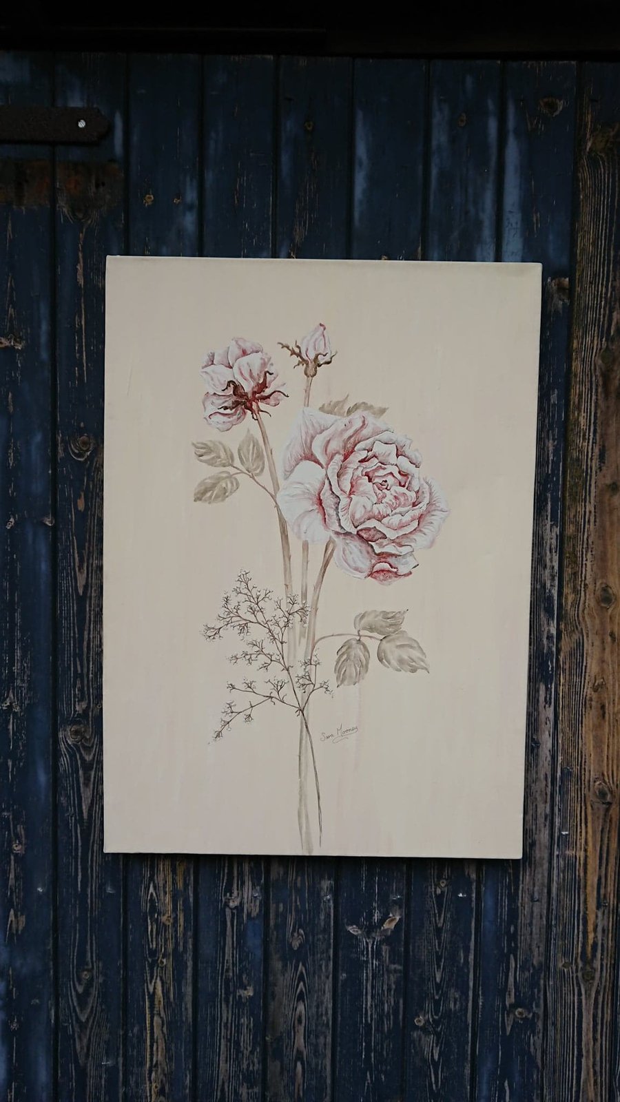 Pink and white painting of roses on canvas with pink and cream background