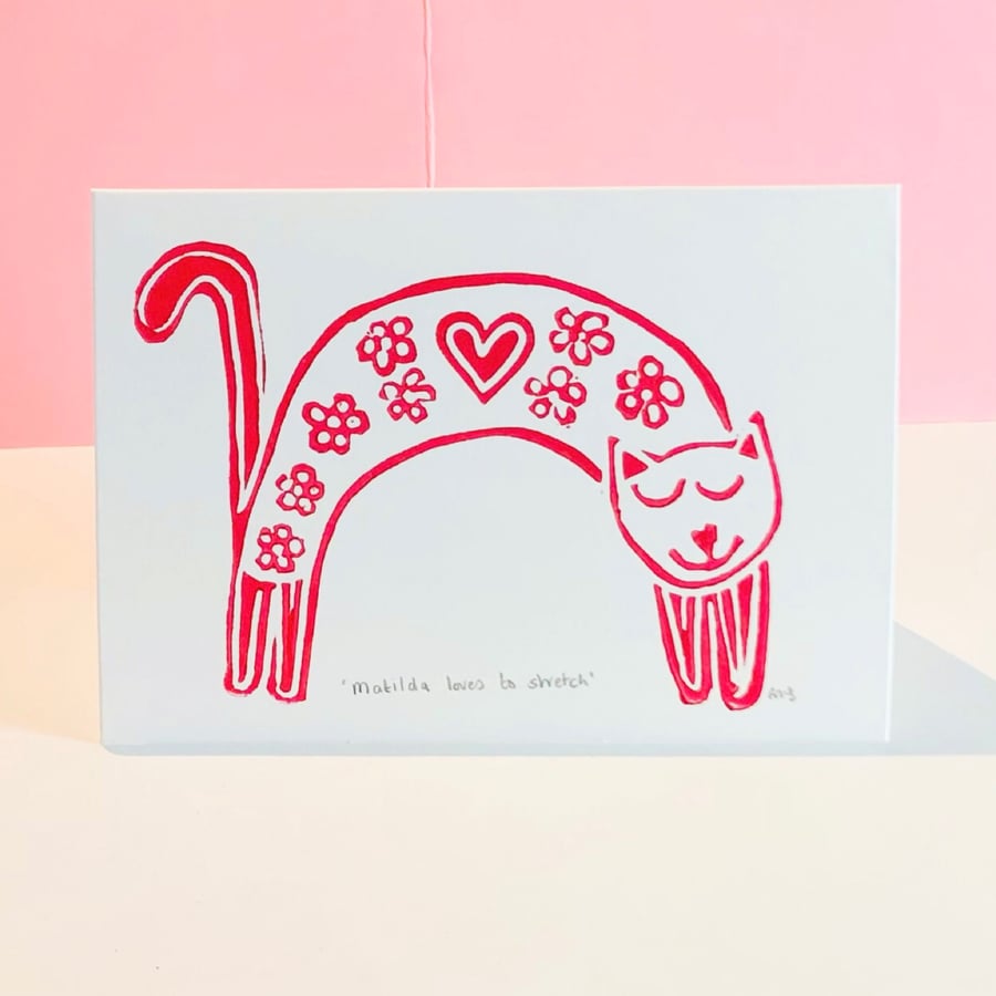 Matilda lives to stretch - handmade cat card - linocut