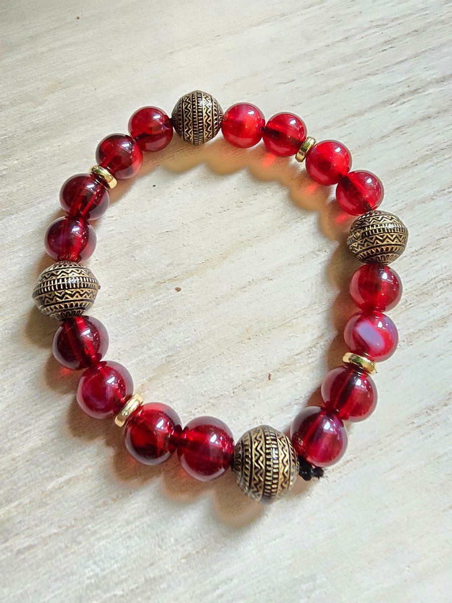 Red and Gold glass beaded bracelet. Elasticated bracelet for most wrist sizes
