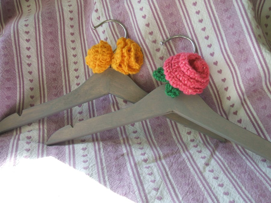 Pair of wooden children's coat hangers - grey with crocheted flowers
