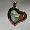 Seaglass filled heart shaped locket and 22inch silver plate chain