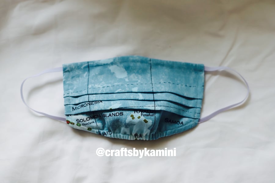 Washable face covering with nose wire and filter pocket