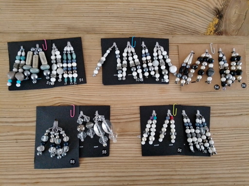 Sets of colour coordinated beaded gift decorations.