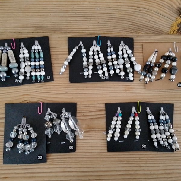 Sets of colour coordinated beaded gift decorations.