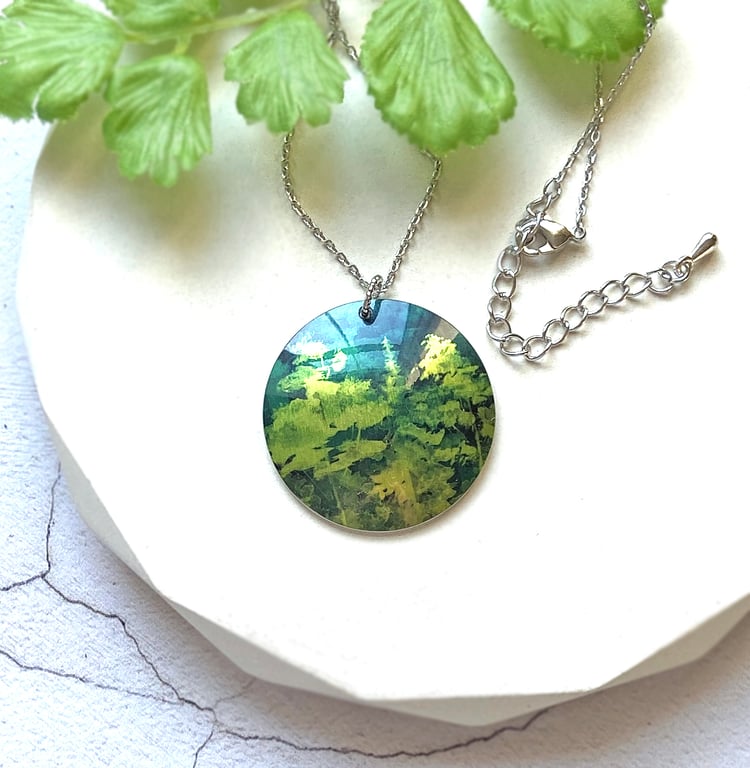 Green necklace, 32mm round pendant, with trees woodland, forest jewellery. (782)