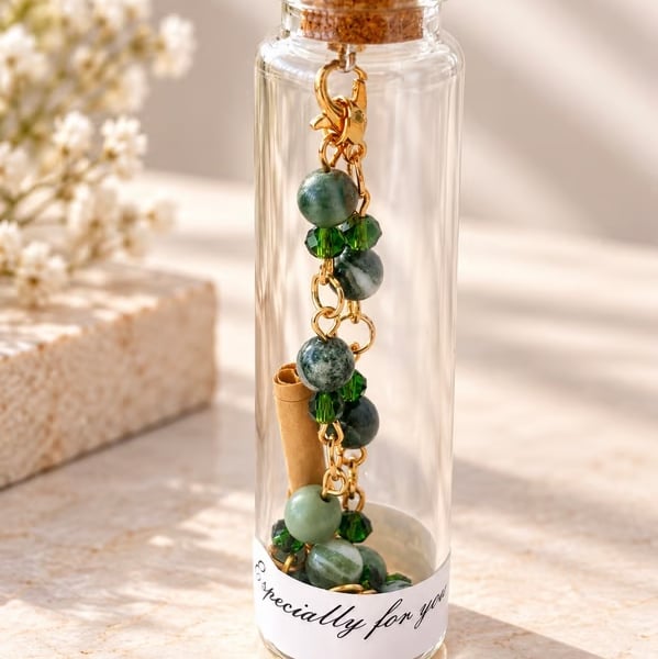 Tree Agate and Emerald Crystal Bracelet in a message bottle.