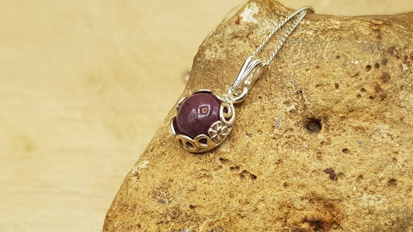 Tiny ruby pendant necklace. July birthstone