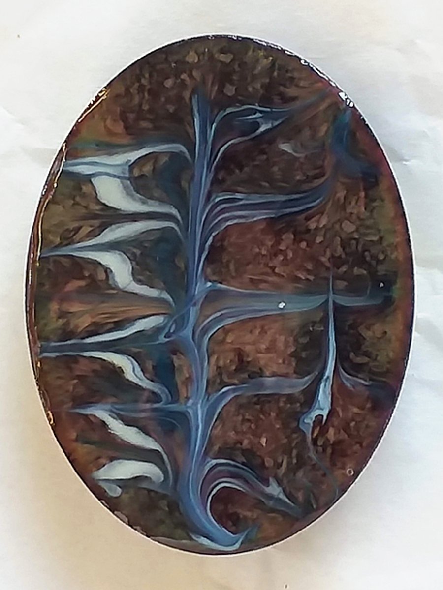 brooch - oval scrolled white and blue-grey on black over clear enamel