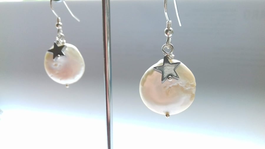 White coin pearls with silver star hook earrings