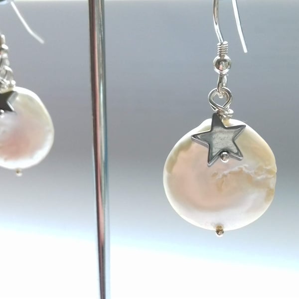 White coin pearls with silver star hook earrings