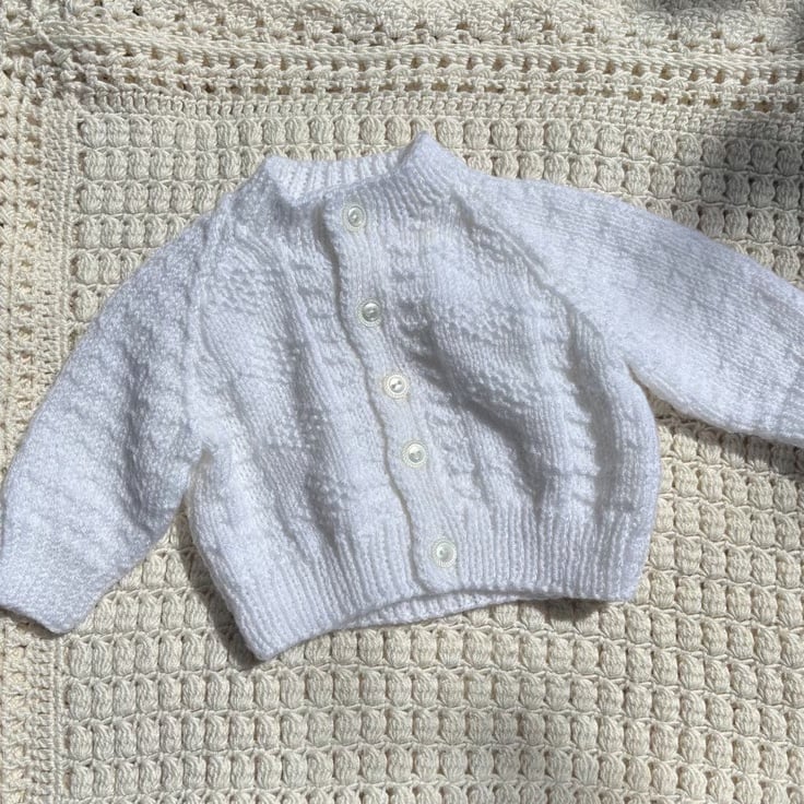 Newborn white textured cardigan
