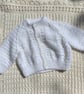 Newborn white textured cardigan