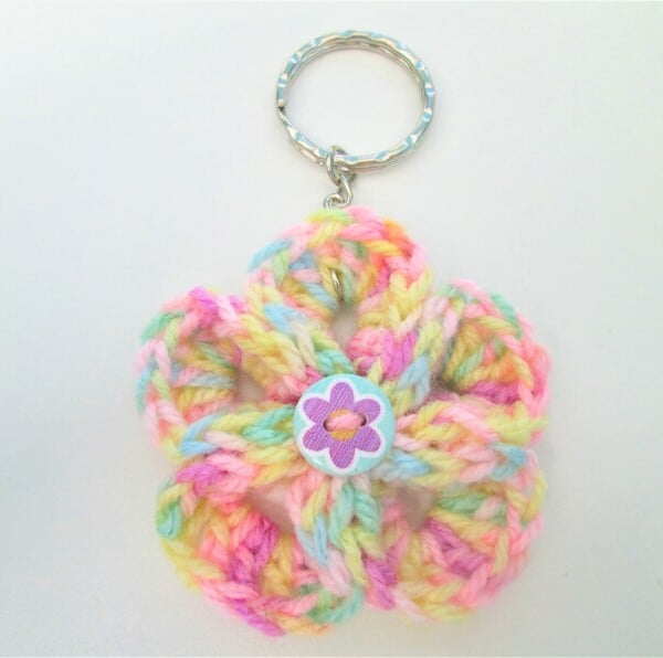 Yellow and multicoloured crochet flower keyring or keychain with flower button