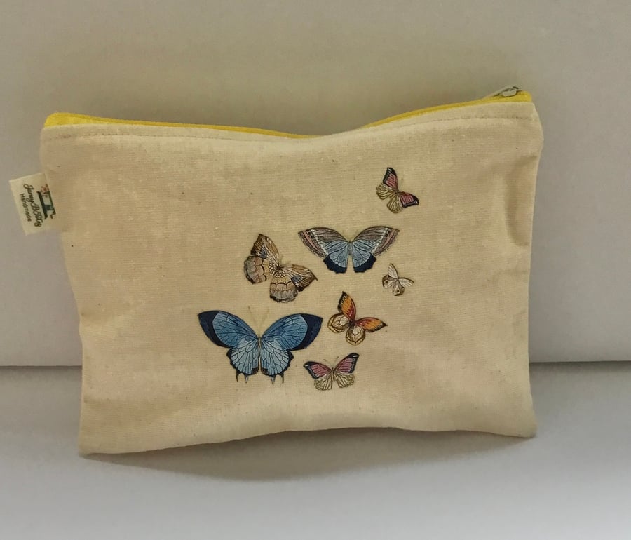 Butterflies in flight makeup bag.