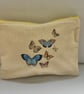 Butterflies in flight makeup bag.