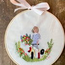 Handmade embroidered art of girl and flowers 