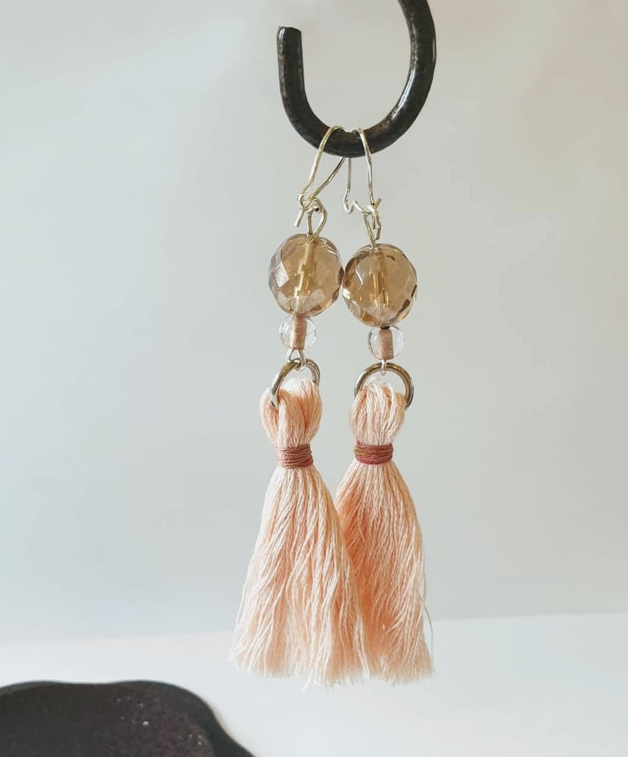 Champagne pink faceted glass bead tassel earrings.