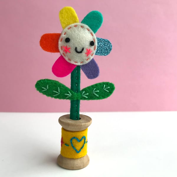Embroidered Happy Flower in Wooden Bobbin- pale cream face with yellow bobbin