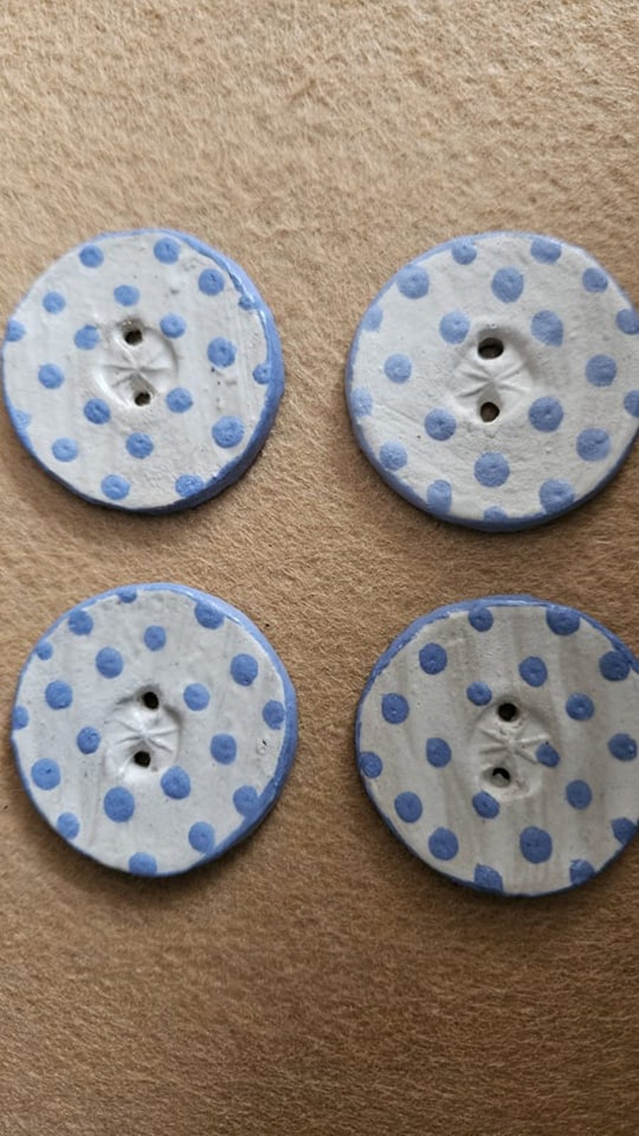Set Of Four Blue and White Spotty Ceramic Buttons