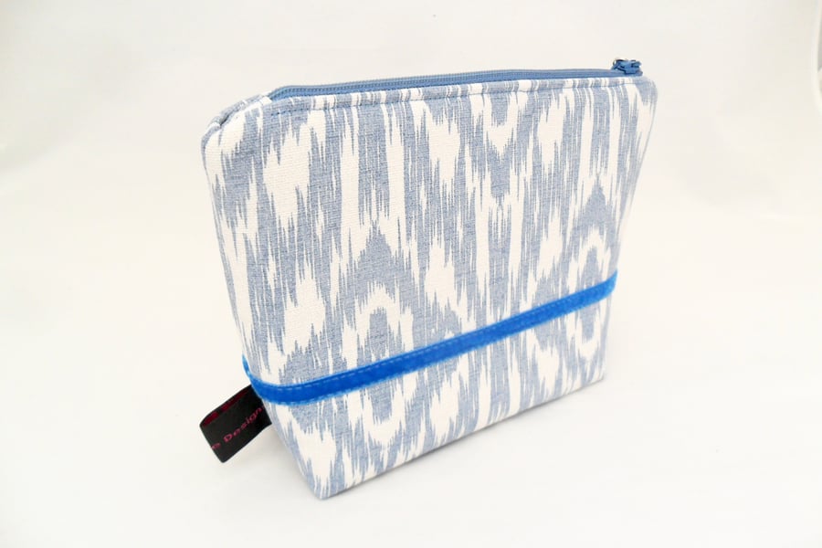 Blue makeup bag in a contemporary fabric