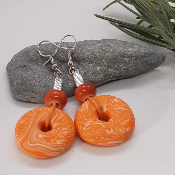 Bright orange statement earrings