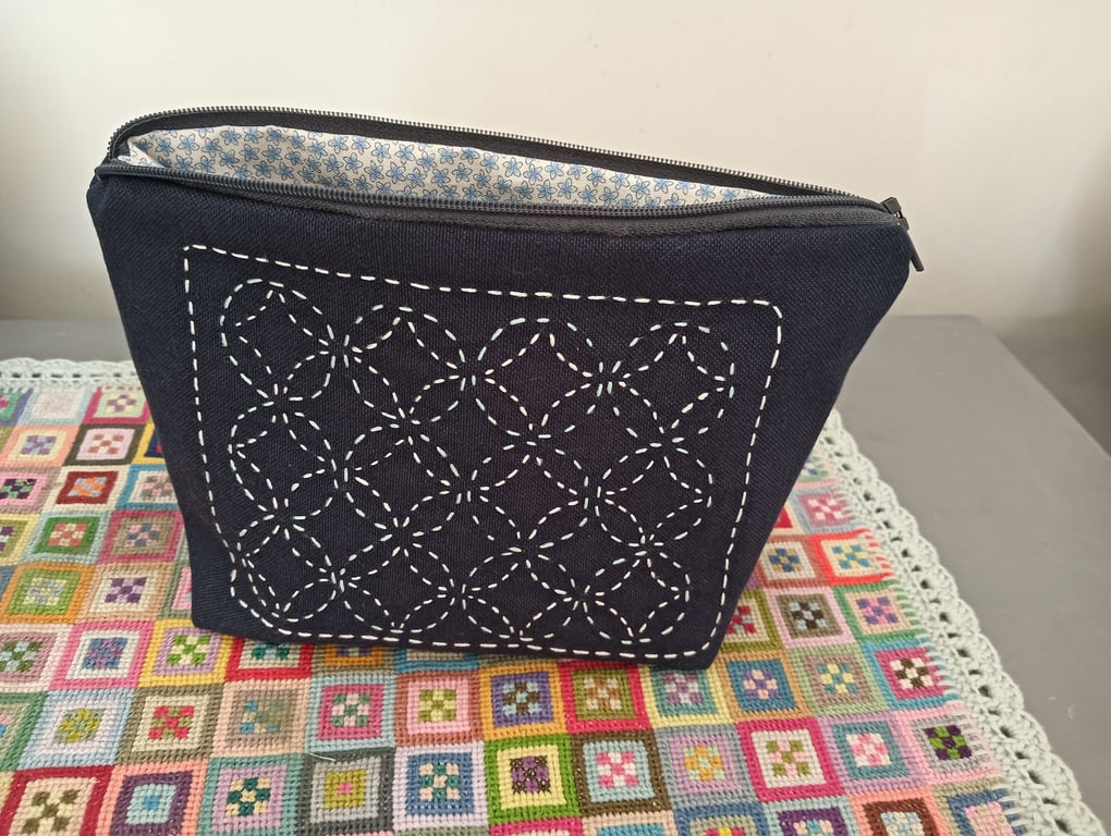 Small fabric purse with sashiko embroidery detail lined with liberty cotton fabr