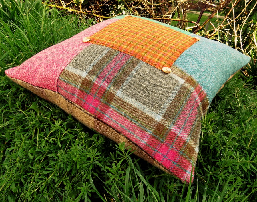 A large statement floor cushion.  Woollen cushion.  Complete with feather pad.
