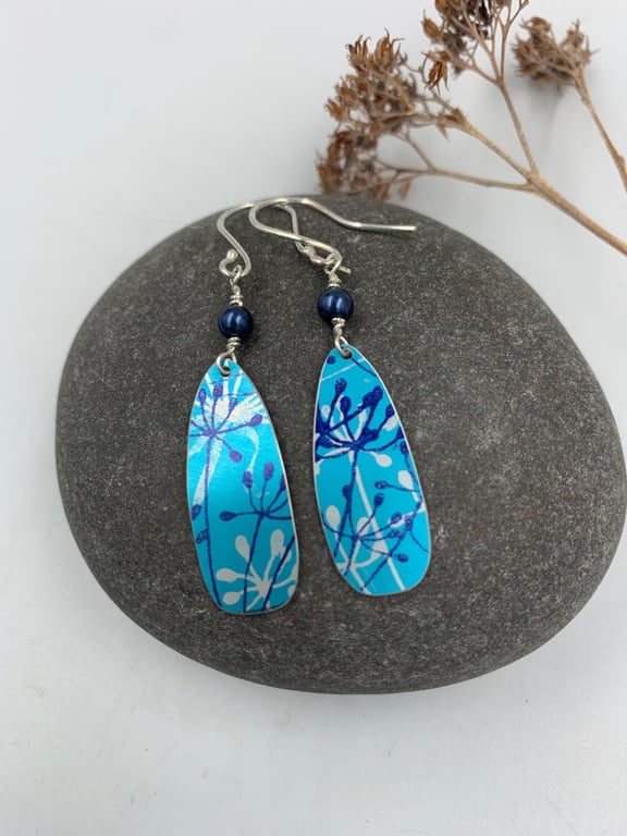 Turquoise aluminium cow parsley drop earrings with blue bead