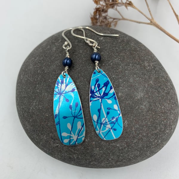 Turquoise aluminium cow parsley drop earrings with blue bead