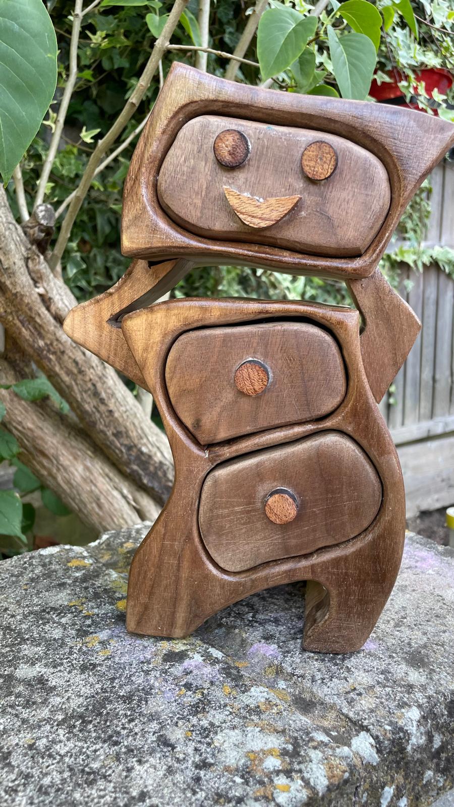 The Thoughtful Box – A Playful Design with 3 Drawers and a Head-in-Hands Style