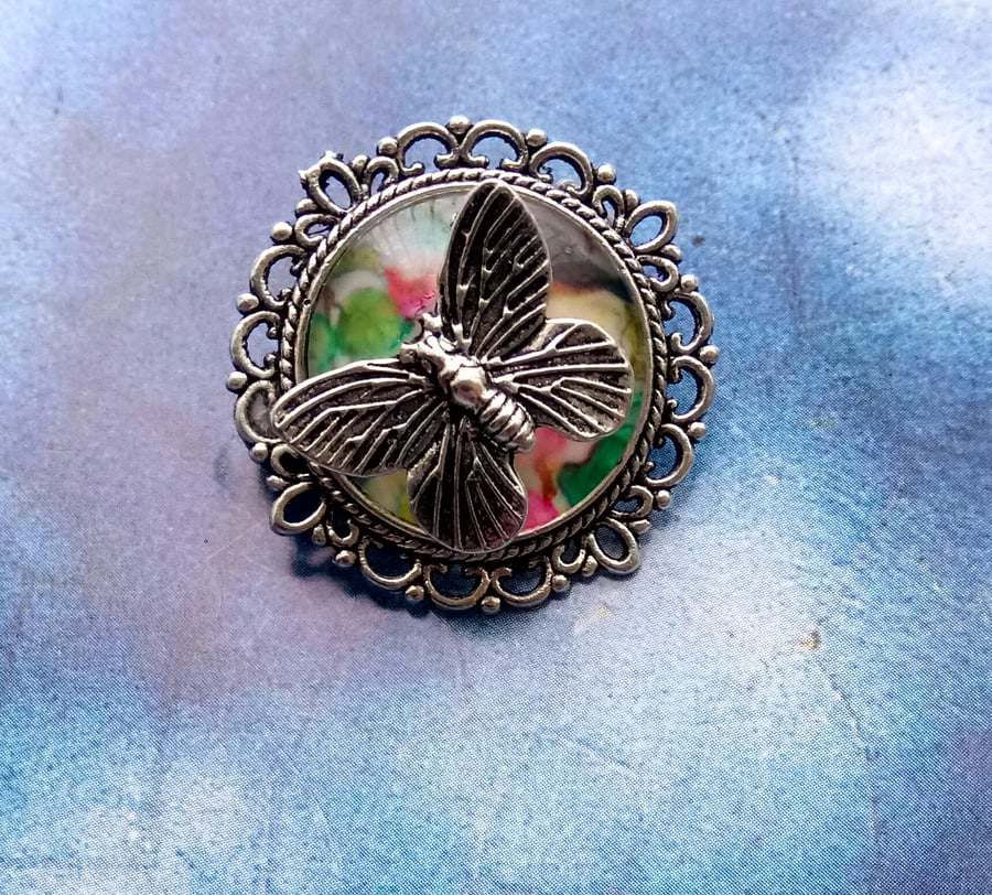 Japanese Decorative Flowers and Birds Brooch with Butterfly Embellishment.  